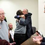 Snohomish County detective Dave Fontenot (center) is hugged as friends and family of Monique Patenaude and Patrick Shunn react to the guilty verdict for John Reed at the Snohomish County Courthouse on Wednesday in Everett. At right,Snohomish County chief criminal deputy prosecutor Craig Matheson talks with Shunns parents (left). (Andy Bronson / The Herald)