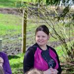 Jefferson County 4-H coordinator Tanya Barnett, left, and Yaks in the Cradle farmer Patricia Young take questions from a flock of visiting children. (Diane Urbani de la Paz/for Peninsula Daily News)