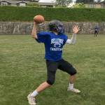Bellevue Christian Vikings senior quarterback Mick Larsen (pictured) will be in his third season as the starting signal caller on the gridiron this fall. Shaun Scott/staff photo