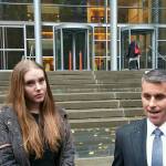 Amelia Powell (left), who has worked as a bikini barista, and Derek Newman (right), who has been representing the Everett baristas in their federal civil rights lawsuit, seen here in November 2017 in Seattle. Newman in May 2018 sought to leave the case. (Rikki King / The Herald)