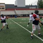 Coby Akana unleashes a pass deep down the sideline to one of his receivers during a spring football practice session on June 8 at Sammamish High School in Bellevue. Shaun Scott, staff photo