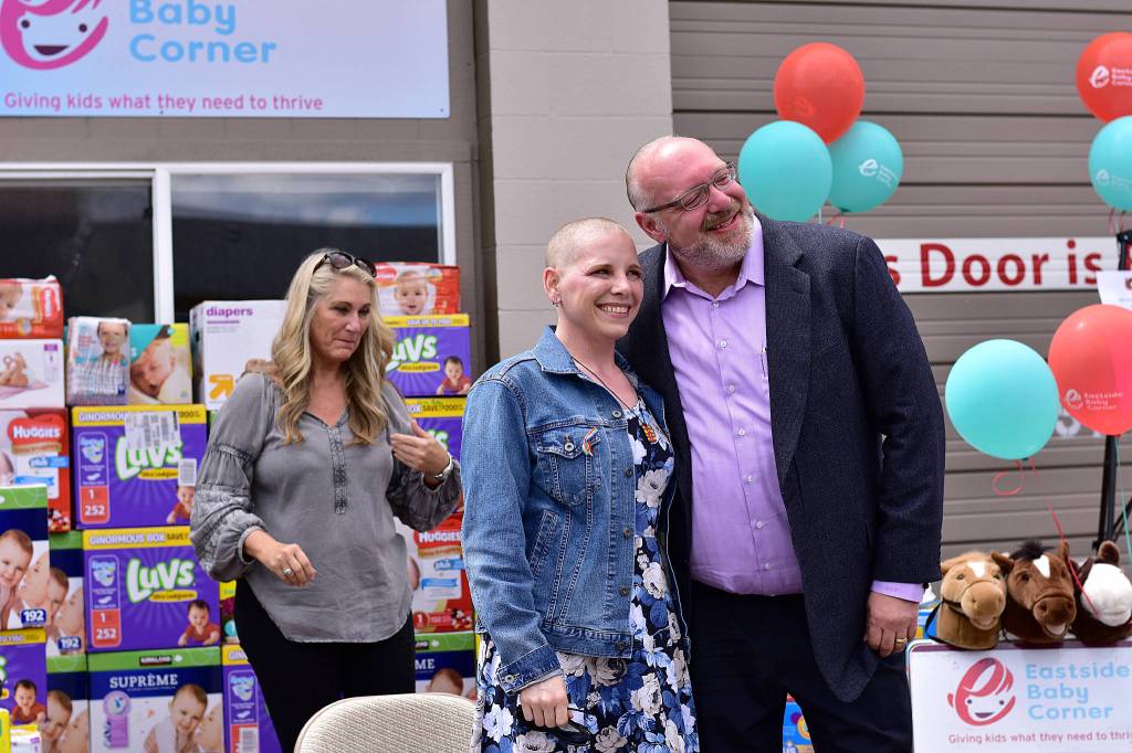 Erin Hansman and Mike Eberhard pose for a picture, post head-shaving. Eberhard is the president of SAP Concur and Hansman is a senior analyst of customer experience at SAP Concur. Photo courtesy of Eastside Baby Corner