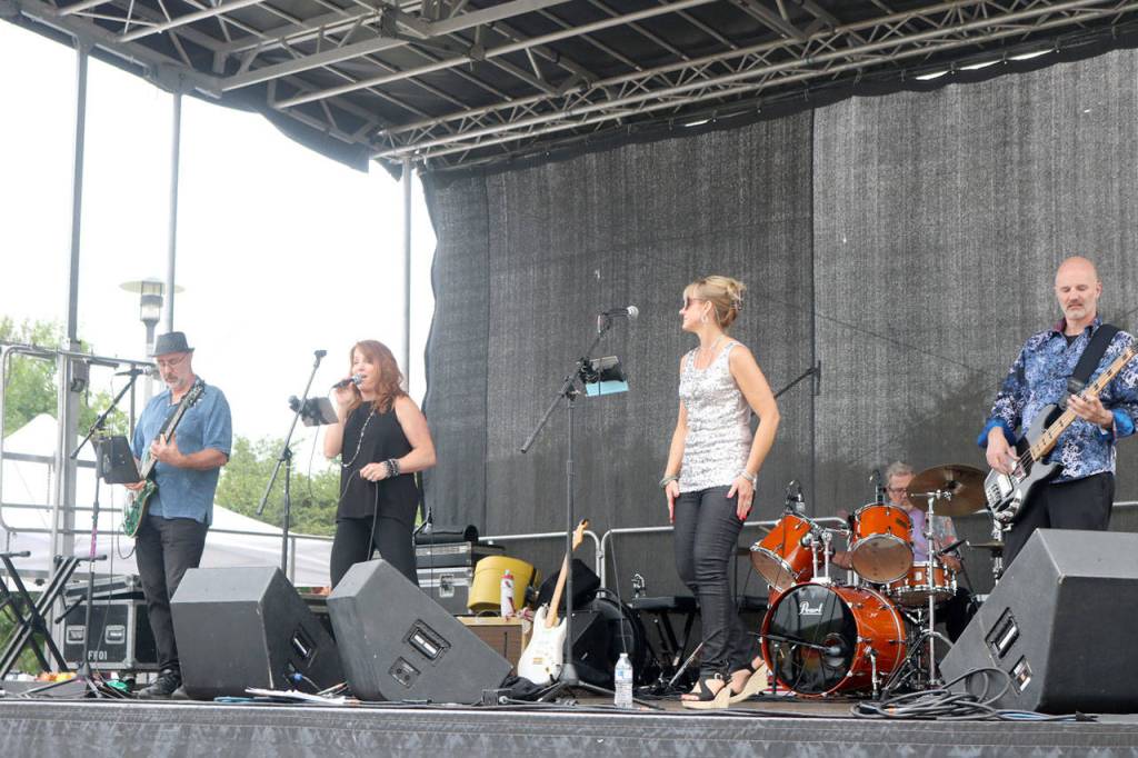 The Blue Lizard Band performs on the main stage at the festival. Evan Pappas/Staff Photo