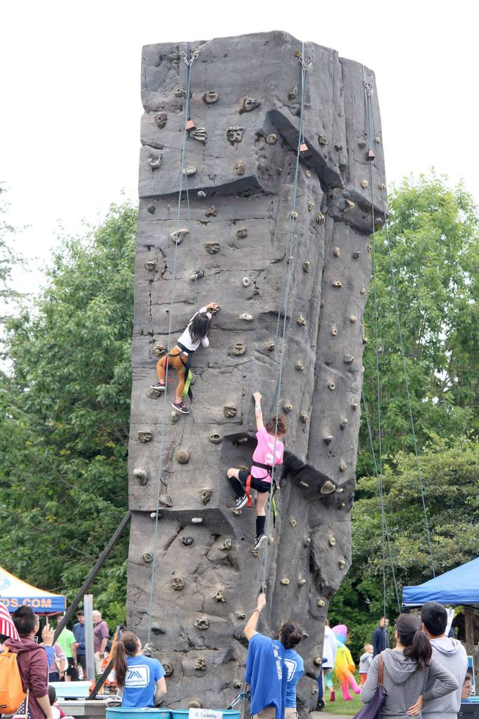 Kids got to try their hand at rock climbing. Evan Pappas/Staff Photo
