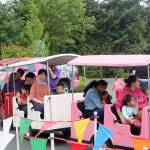 Families take a small train around the park. Evan Pappas/Staff Photo