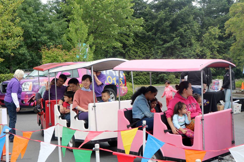 Families take a small train around the park. Evan Pappas/Staff Photo