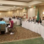 The Issaquah Chamber of Commerce had two long tables set up that stretched across the room to accommodate the large number of primary election candidates. Evan Pappas/Staff Photo
