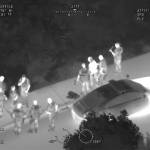 Bellevue police arrest the suspect as seen from as seen from King County Sheriffs Guardian One helicopter. Screenshot from the King County Sheriff Air Support YouTube page