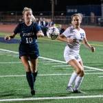 Juanita senior Allyson Ingersoll, left, and Bellevue freshman midfielder Kendall Serres, right, battle for possession of the ball. The Rebels defeated the Wolverines 1-0 on Sept. 27 at Juanita High School in Kirkland. Photo courtesy of Stephanie Ault Justus