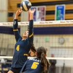 Bellevue Wolverines junior setter Meghan Weber sets up an opportunity for one of her teammates to score a point against the Mercer Island Islanders in a rivalry matchup on Oct. 2. Bellevue earned a comeback 3-2 victory against Mercer Island. Photo courtesy of Patrick Krohn/Patrick Krohn Photography