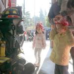 Jaden, 3-years-old, meets Probationary Firefighter Chuck Terrell at the Fire Department Open House on Saturday, Oct. 13. Evan Pappas/Staff Photo