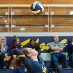 Bellevue Wolverines senior Jenna Keenan serves in a matchup against the Lake Washington Kangaroos on Oct. 18. Bellevue defeated Lake Washington 3-0 (26-24, 25-19, 25-22) on senior night. Photo courtesy of Patrick Krohn/Patrick Krohn Photography