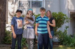 Ashton, 13, Chloe, 11, Cameron, 15, and their mother Joanne Wilson pose for a photo in front of their Habitat for Humanity townhome in Bellevue. Photo by Jose Perez.                                 Ashton, 13, Chloe, 11, Cameron, 15, and their mother Joanne Wilson pose for a photo in front of their Habitat for Humanity townhome in Bellevue. Photo by Jose Perez.                                 Ashton, 13, Chloe, 11, Cameron, 15, and their mother Joanne Wilson pose for a photo in front of their Habitat for Humanity townhome in Bellevue. Photo by Jose Perez.                                 Ashton, 13, Chloe, 11, Cameron, 15, and their mother Joanne Wilson pose for a photo in front of their Habitat for Humanity townhome in Bellevue. Photo by Jose Perez.