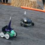 Two pumpkins race down the hill in the South Bellevue Community Center parking lot at the Great Pumpkin Race on Oct. 27. Evan Pappas/Staff Photo