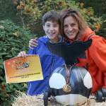 Max Fleming, 13, and his pumpkin P31 Gordca won first place at the morning run of the Great Pumpkin Race on Oct. 27. Evan Pappas/Staff Photo