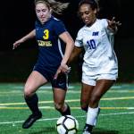 Bellevue Wolverines junior midfielder Courtney Serres, left, and Lake Washington player Haimanot Hanson, right, battle for possession of the ball in a loser-out 3A KingCo playoff game. Lake Washington defeated Bellevue 2-0 on Nov. 1 at Bellevue High School. The Wolverines finished the 2018 season with an overall record of 6-9-2. Photo courtesy of Stephanie Ault Justus
