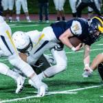 The Bellevue Wolverines football team improved their overall record to 10-0 courtesy of a 34-7 victory against Shorecrest in a winner-to-state, loser-out playoff game on Nov. 3 at Bellevue Memorial Stadium. Bellevue junior running back Alex Reid (pictured) battled for extra yardage against the Shorecrest defense. The Wolverines will host Snohomish in the first round of the Class 3A state playoffs at 7 p.m. on Nov. 9 at Bellevue Memorial Stadium. Photo courtesy of Stephanie Ault Justus