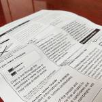 Early results: Carbon fee fails as gun control passes