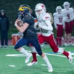 Bellevue Wolverines junior running back Alex Reid breaks free for a long gain against the Snohomish Panthers. Reid had two rushing touchdowns in Bellevues 66-33 victory against the Panthers on Nov. 9 at Bellevue Memorial Stadium. Photo courtesy of Stephanie Ault Justus