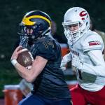 Bellevue Wolverines junior running back Alex Reid breaks free for a long gain against the Snohomish Panthers. Reid had two rushing touchdowns in Bellevues 66-33 victory against the Panthers on Nov. 9 at Bellevue Memorial Stadium. Photo courtesy of Stephanie Ault Justus