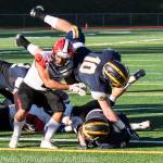 Bellevue Wolverines senior running back Drew Fowler (pictured) scored four rushing touchdowns against the Yelm Tornados in the Class 3A state quarterfinals on Nov. 17 at Bellevue Memorial Stadium. Photo courtesy of Stephanie Ault-Justus
