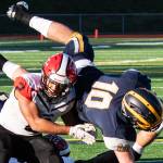 Bellevue Wolverines senior running back Drew Fowler (pictured) scored four rushing touchdowns against the Yelm Tornados in the Class 3A state quarterfinals on Nov. 17 at Bellevue Memorial Stadium. Photo courtesy of Stephanie Ault-Justus