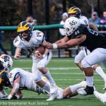 Wolverine Alex Reid rolls through the middle against Eastside Catholic. Photo courtesy of Stephanie Ault Justus