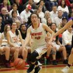 Newport Knights senior guard Nicole Chan drives to the hoop against the Issaquah Eagles in a game during the 2017-18 season. Chan, who is one of six seniors on the varsity roster during the 2018-19 season, wants to see her squad advance to the Class 4A state tournament at the Tacoma Dome in March of 2019. Photo courtesy of Don Borin/Stop Action Photography