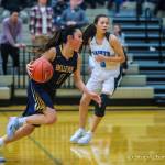 The Bellevue Wolverines registered a 52-47 win against the Interlake Saints on Dec. 7 at Interlake High School in Bellevue. The Wolverines improved their overall record to 2-2 with the win while Interlake dropped to 0-5. Bellevue junior guard Kara Choi (pictured) takes the ball to the hoop against the Interlake Saints. Photo courtesy of Don Borin/Stop Action Photography