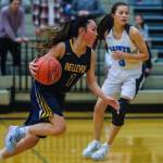 The Bellevue Wolverines registered a 52-47 win against the Interlake Saints on Dec. 7 at Interlake High School in Bellevue. The Wolverines improved their overall record to 2-2 with the win while Interlake dropped to 0-5. Bellevue junior guard Kara Choi (pictured) takes the ball to the hoop against the Interlake Saints. Photo courtesy of Don Borin/Stop Action Photography