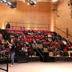 Dr. David Stovall speaks to more than 100 Bellevue School District high school students about school versus education and how to be wary of those trying to manipulate them at the fourth annual BOOM Experience at Bellevue College. Madison Miller/staff photo.