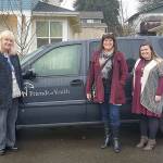 (L-R) Friends of Youth President and CEO Terry Potter and Senior Director of Homeless Youth Services Karina Wiggins receive van from Councilmember Balducci. Courtesy of King County.