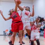 Sammamish Totems sophomore Tia Robinson (No. 40) battles for a rebound against Franklin Pierce sophomore Paradise Dorrough, left, in a non-league matchup on Jan. 3 in Bellevue. Photo courtesy of Patrick Krohn/Patrick Krohn Photography