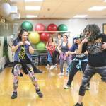 The two-hour event was led by eight Zumba instructors. Zumba instructor Trina Martini led a dance on Jan. 5 at the YMCA in Bellevue. Stephanie Quiroz/staff photo.