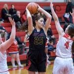 Newport Knights senior post player Sophia Dominitz, center, looks for a teammate to pass the ball to in a matchup against Mount Si Wildcats. Newport defeated Mount Si, 43-37, on Jan. 16 in Snoqualmie. Photo courtesy of Patrick Krohn/Patrick Krohn Photography