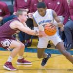 Interlake Saints junior Ibrahim Ibrahim, right, scored a team-high 10 points in a loss against the Mercer Island Islanders on Jan. 22. Mercer Island defeated Interlake 63-46. Photo courtesy of Patrick Krohn/Patrick Krohn Photography