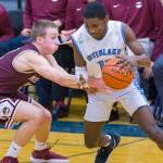 Interlake Saints junior Ibrahim Ibrahim, right, scored a team-high 10 points in a loss against the Mercer Island Islanders on Jan. 22. Mercer Island defeated Interlake 63-46. Photo courtesy of Patrick Krohn/Patrick Krohn Photography
