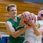 Bellevue Wolverines senior Hunter Hansen, right, and Bishop Blanchets Cade Prinizivalli, left, battle for a rebound in the paint on Feb. 14 at Bellevue High School. Hansen scored a team-high 17 points for the Wolverines. Photo courtesy of Patrick Krohn/Patrick Krohn Photography