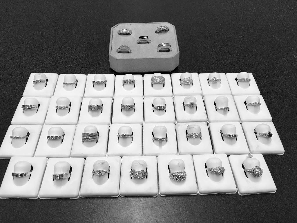 Multiple rings were acquired at the suspects home. Photo obtained from Bellevue police reports