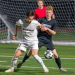 Mercer Island Islanders senior Dakota Promet, left, and Sammamish freshman Andrew Wilbert, right, battle for possession of the ball on March 26 at Sammamish High School. Mercer Island defeated Sammamish 1-0. Photo courtesy of Patrick Krohn/Patrick Krohn Photography