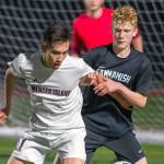 Mercer Island Islanders senior Dakota Promet, left, and Sammamish freshman Andrew Wilbert, right, battle for possession of the ball on March 26 at Sammamish High School. Mercer Island defeated Sammamish 1-0. Photo courtesy of Patrick Krohn/Patrick Krohn Photography
