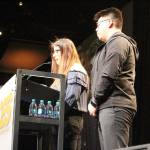 Rosa and Erik, whose last names have been withheld share their experiences being a part of Youth Eastside Services (YES) Latino H.E.A.T. student-leadership program at the Invest in Youth Breakfast on March 20. Madison Miller/staff photo