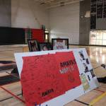 Raven Patina, a junior, adds a piece to Amaya Storseths memorial. Madison Miller/staff photo
