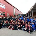 Courtesy photo                                Three Bellevue School District robotics teams after a competition in late March. From left: International School robotics team, Sammamish High School robotics team, and Interlake High School robotics team.