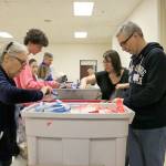 Retail stores in Bellevue, Redmond and Kirkland donated gift cards to purchase items for the hygiene kits and pantry packs. Stephanie Quiroz/staff photo