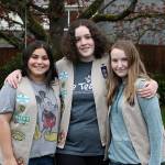 Madison Miller / staff photo                                Tillicum Middle School eighth-grade Girl Scouts are working to save endangered animals through an art contest. From left: Lola Rosenwald, Gwen Cable and Emma Rose Mulholland Salazar.