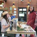 Families learned ways to help protect the environment through a variety of eco-stations at the Lewis Creek Park Visitors Center on April 20. Stephanie Quiroz/staff photo