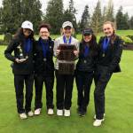 Sammamish Totems golfers Mehr Luthra, Mikaela Ikeda, McKenna Lamb, Lily Bai and Sierra Hopper celebrate after their teams victory at the Burlington-Edison Invitational on April 22. Photo courtesy of Annette LaBissoniere