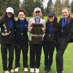 Sammamish Totems golfers Mehr Luthra, Mikaela Ikeda, McKenna Lamb, Lily Bai and Sierra Hopper celebrate after their teams victory at the Burlington-Edison Invitational on April 22. Photo courtesy of Annette LaBissoniere