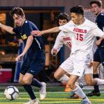 Bellevue Wolverines forward Jed Michael, left, scored two goals against the Juanita Rebels on April 25. Bellevue defeated Juanita 2-0 to improve its overall record to 10-0-3. Photo courtesy of Stephanie Ault Justus